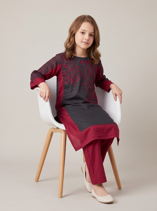Lifestyle view of maroon and black cotton embroidery kurti set