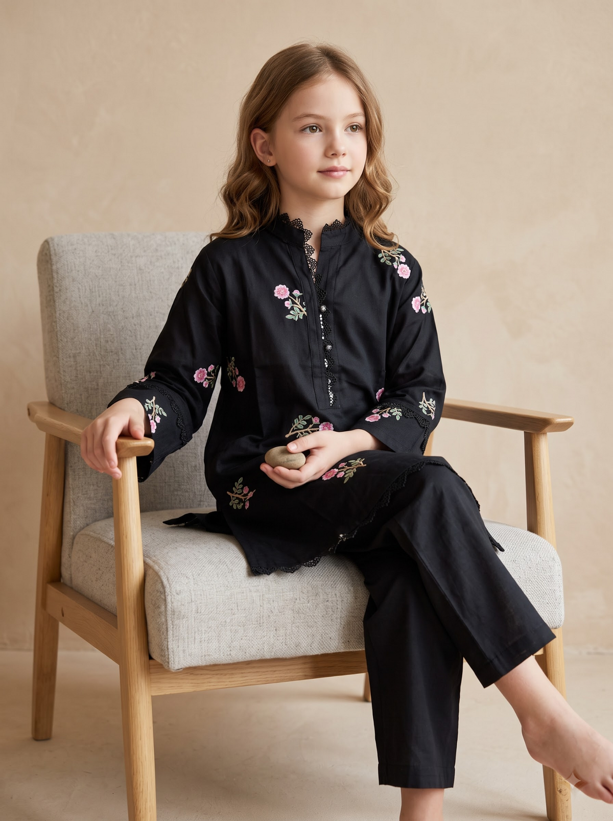 Girls black cotton printed lace work frock set 1767 Black seated pose