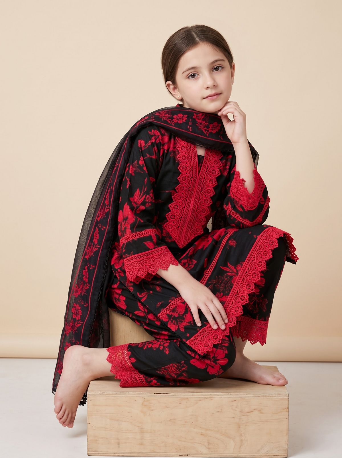 Girls black and red cotton printed lace work frock set 1769 Black seated pose