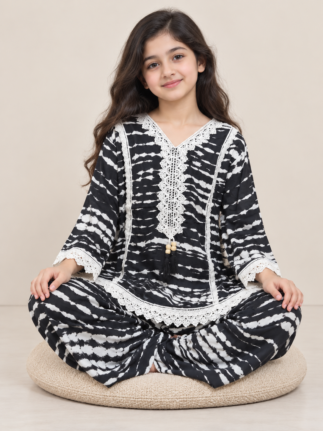 Side view of the black and white printed cotton plazo set