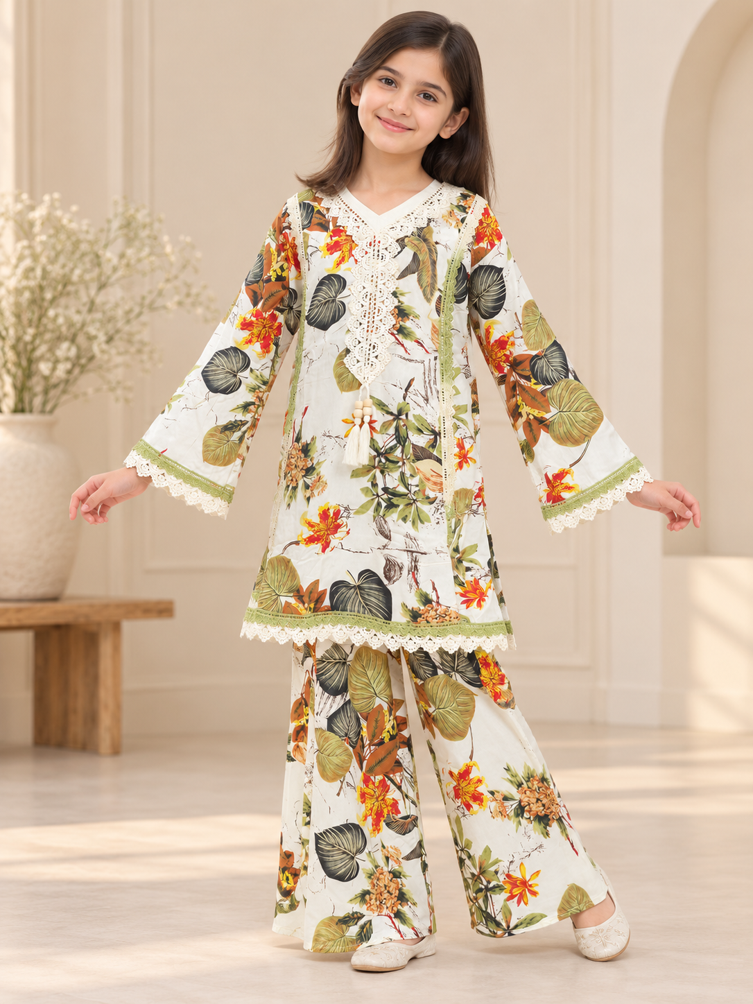 Front view of a cream botanical printed cotton plazo set with lace trim