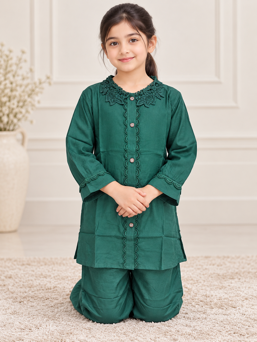 Front view of the emerald green cotton lace work cord set