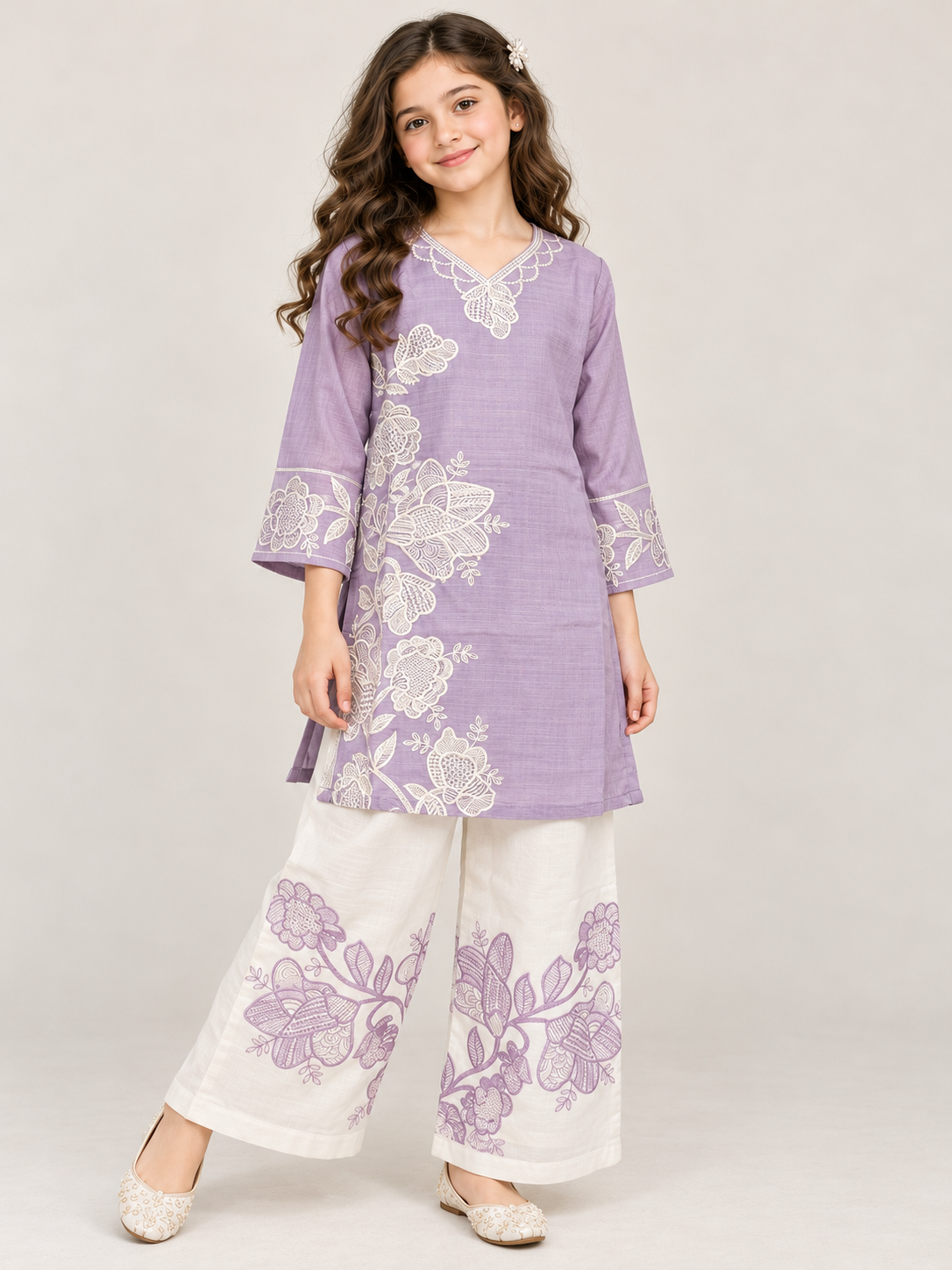 Front view of the purple cotton embroidery kurti set on a model