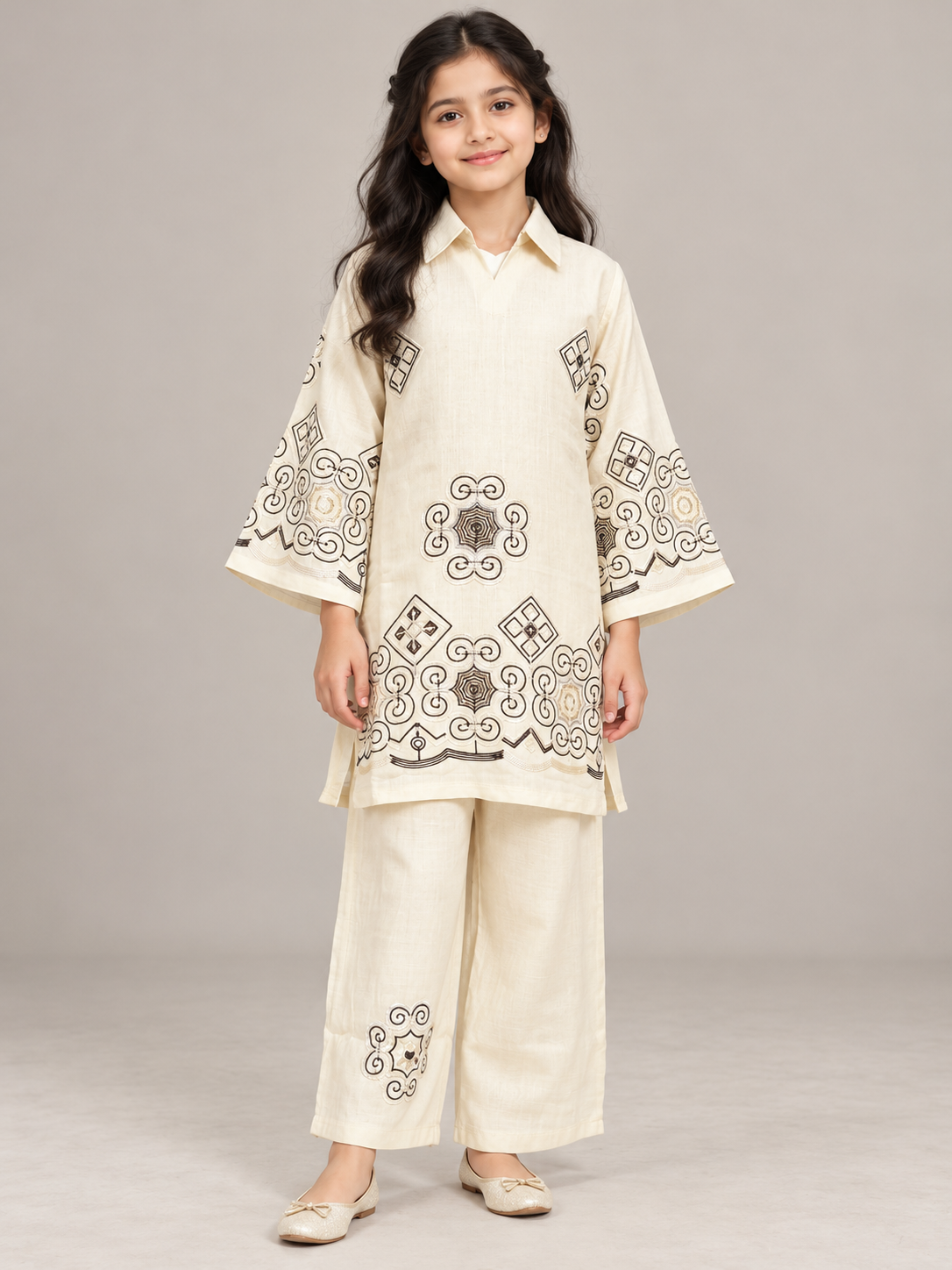 Front view of the cream cotton embroidery kurti set on a model